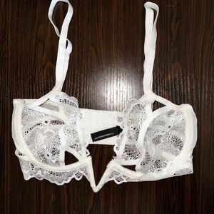 White 32D Thistle & Spire bra
See-through lace cups 
32d
Only worn a few times